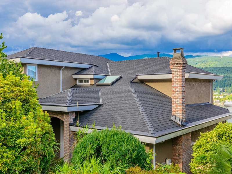 Featured image for “Asphalt vs Composite Shingles (Cost, Maintenance, & More)”
