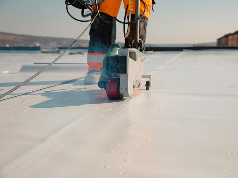Close-up of heat-welded waterproof flat roofing.