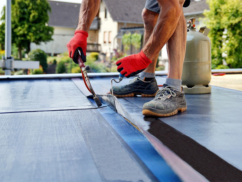 Featured image for “How to (Properly) Repair a Commercial Flat Roof”