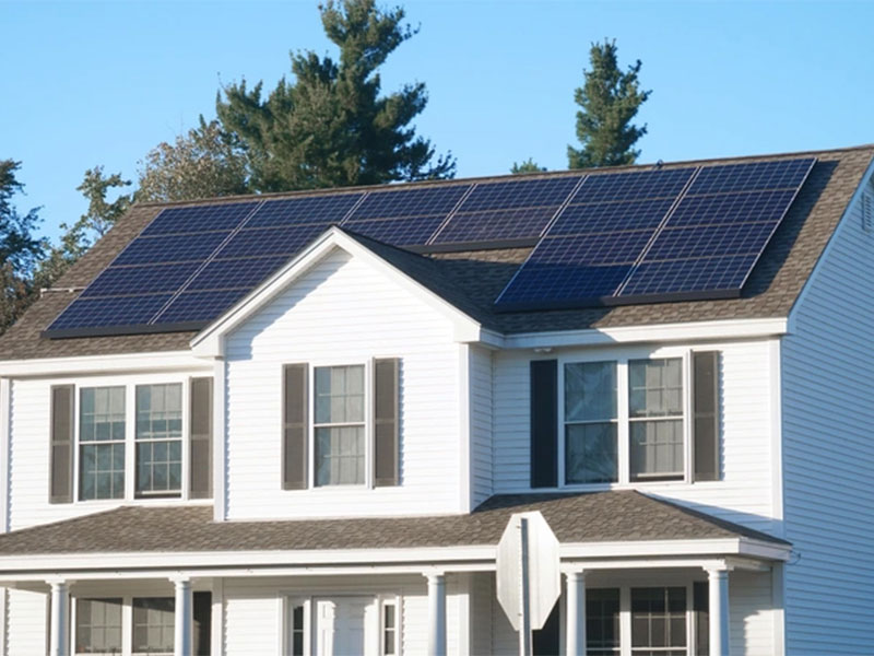 Solar panels installed on a residential house roof.