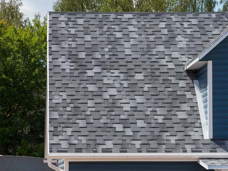 Close-up of asphalt shingles installed on a roof
