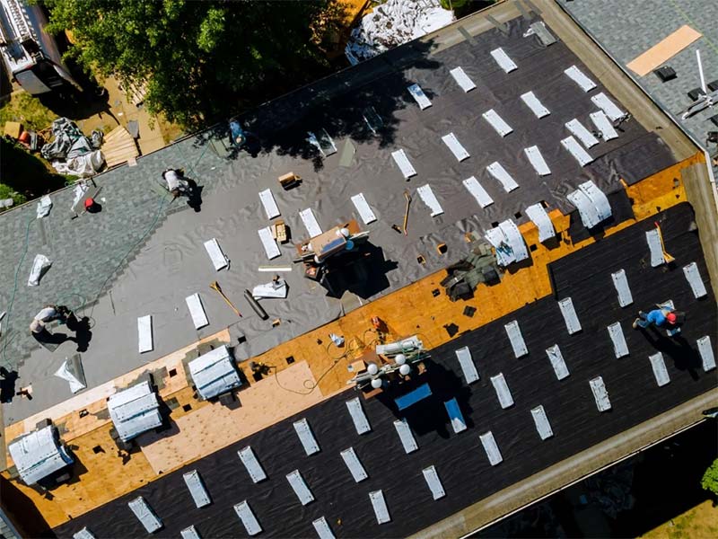 Aerial view of large roof replacement project