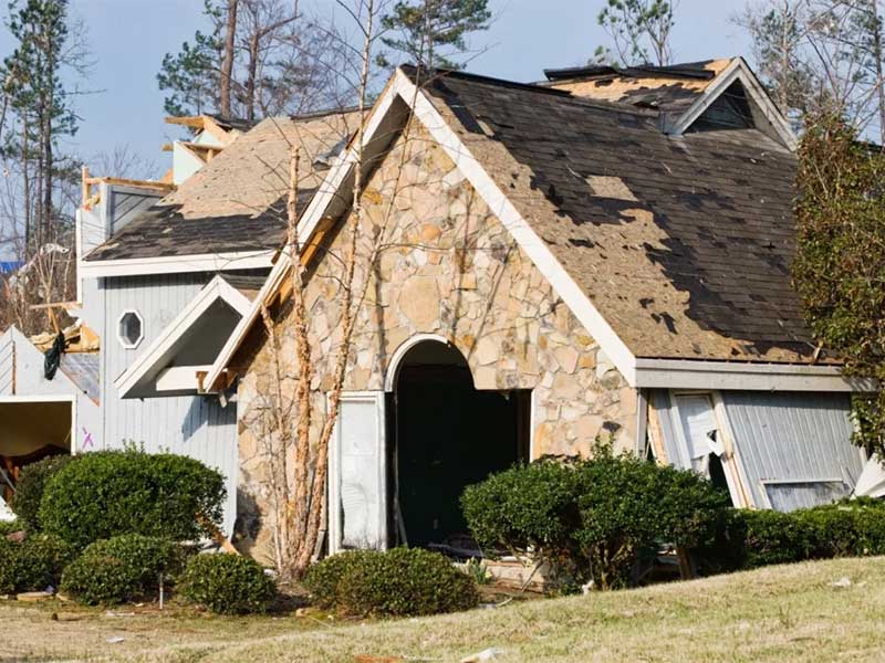 Home roof damage after a tornado