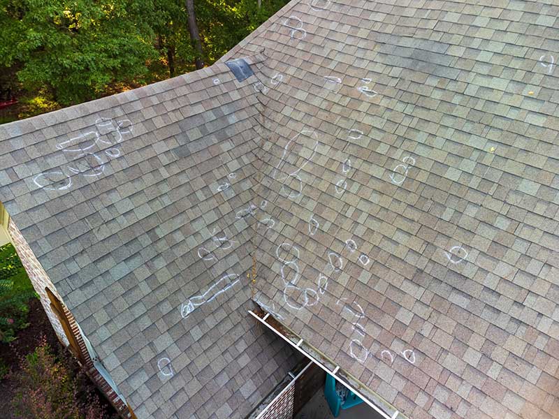 Featured image for “What Does Hail Damage Look Like on a Roof? (7 Signs)”