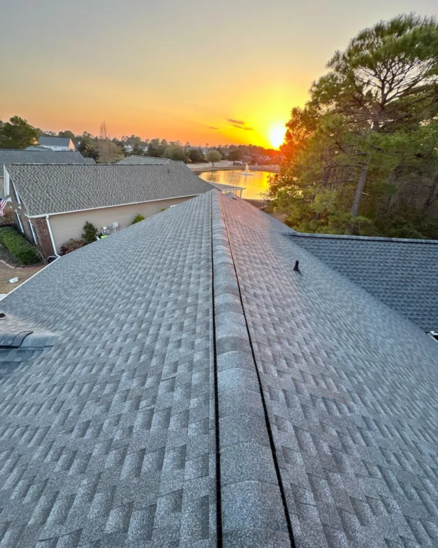 asphalt shingle new roof on residential home