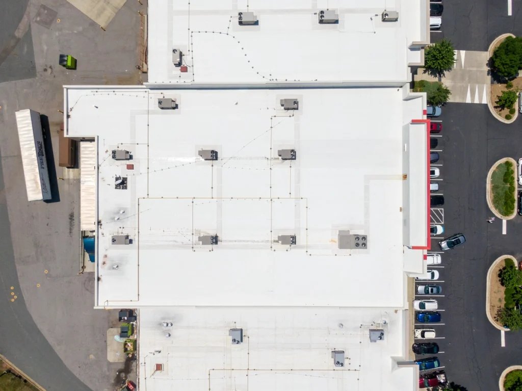 A white coated larger commercial roof