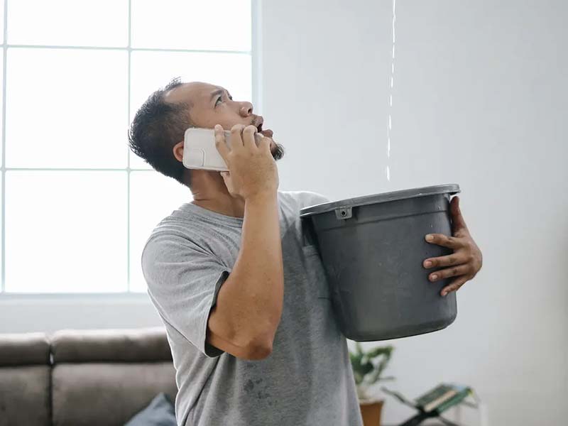 Featured image for “Water Leaking From Ceiling? (5 Signs It’s Coming From Your Roof)”