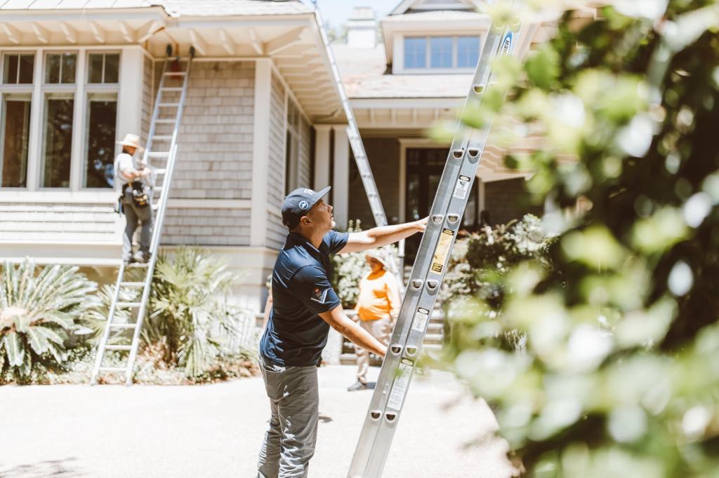 A person is working in new house construction