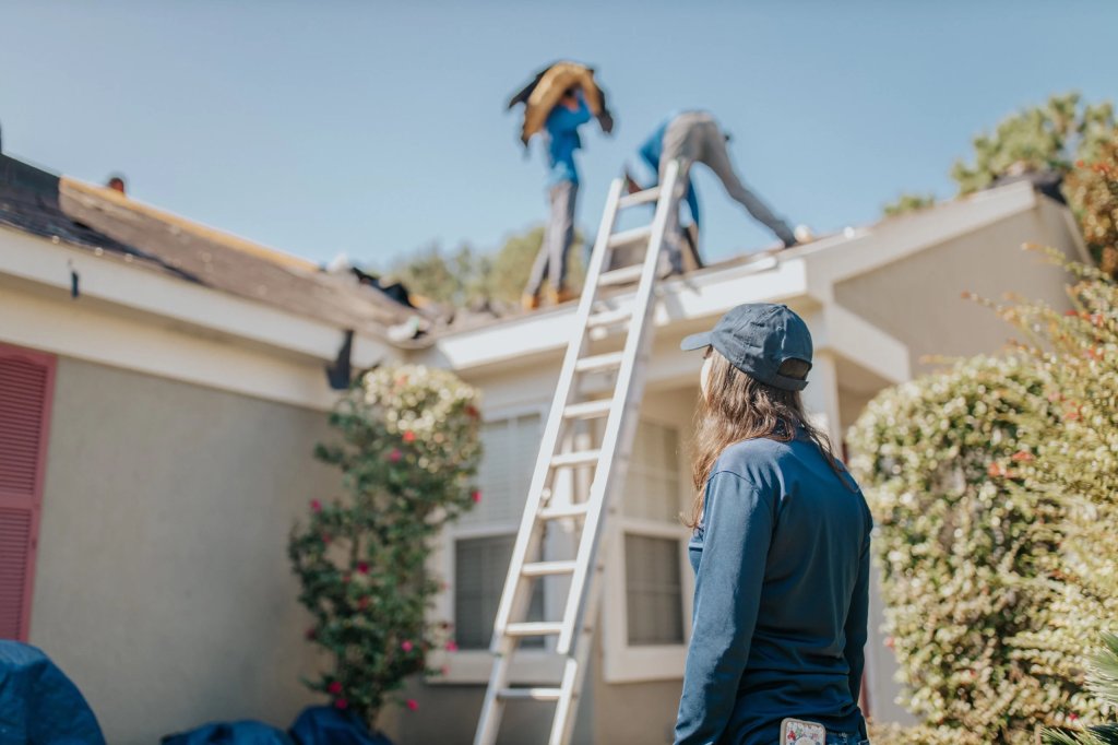 Inspecting a ongoing roof repair