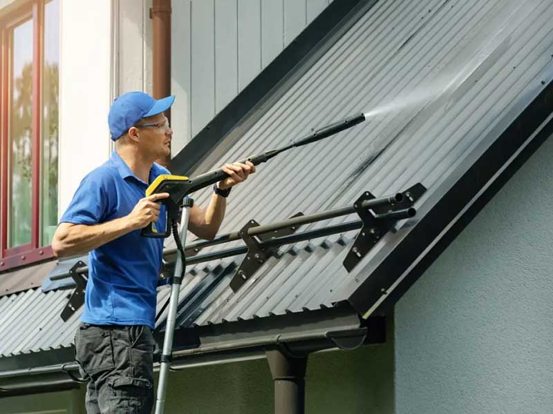 Power washing metal roof