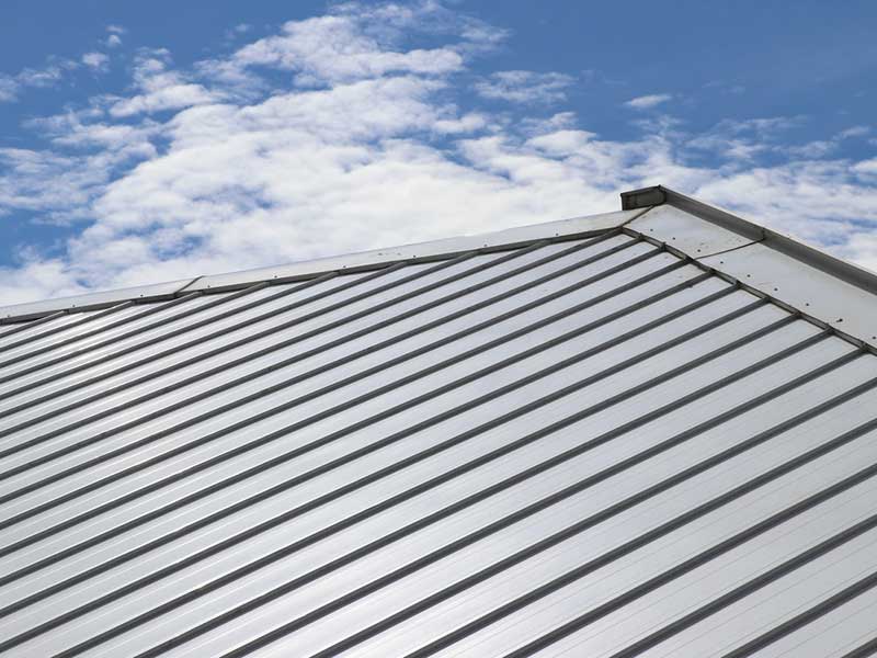 Featured image for “What Is the Minimum Slope for Metal Roof Systems?”