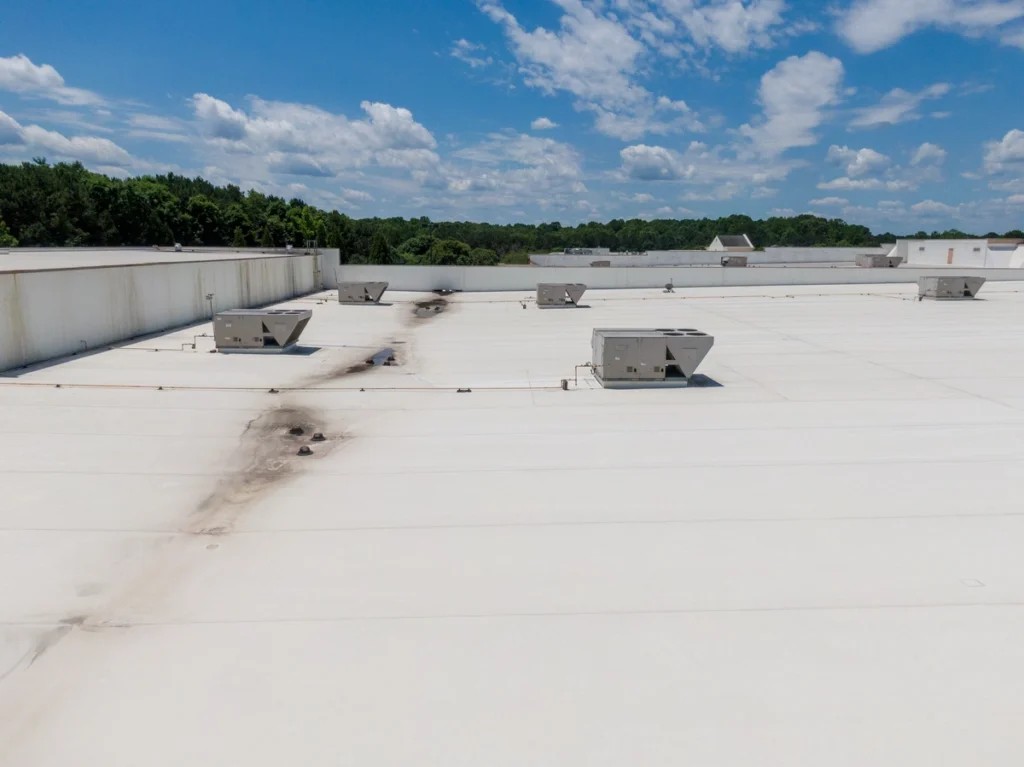 A white coated larger commercial roof