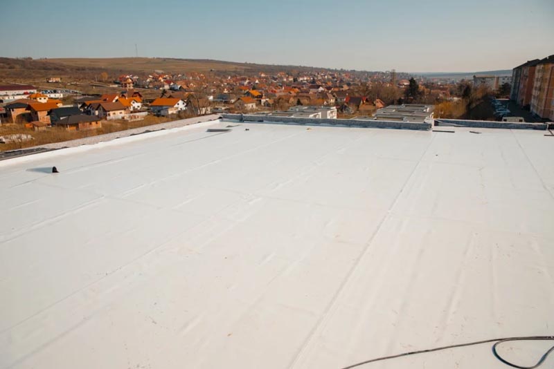 Featured image for “Low Slope Roof Options for 2024 (Styles, Materials & More)”