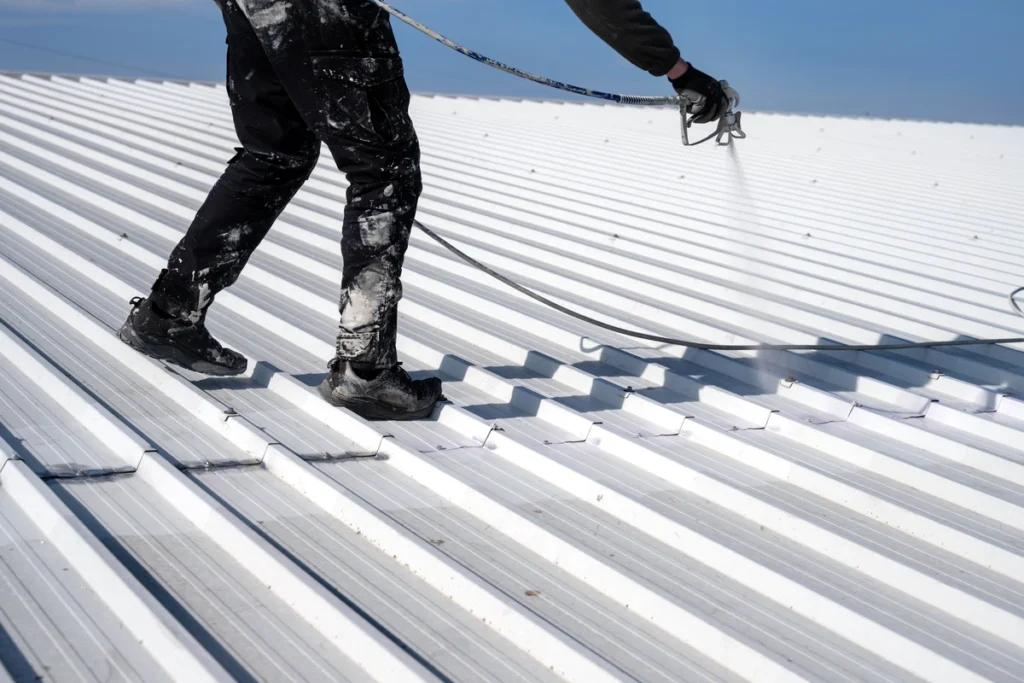 A person is working on a metal roof